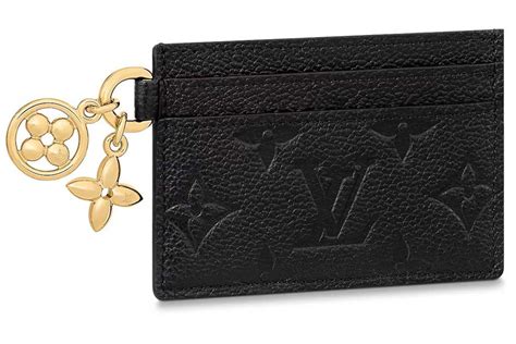 louis vuitton jack and lucie charm|Louis Vuitton card holder.